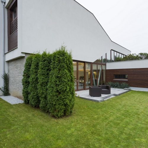 Big expensive residence with spacious green garden and small porch
